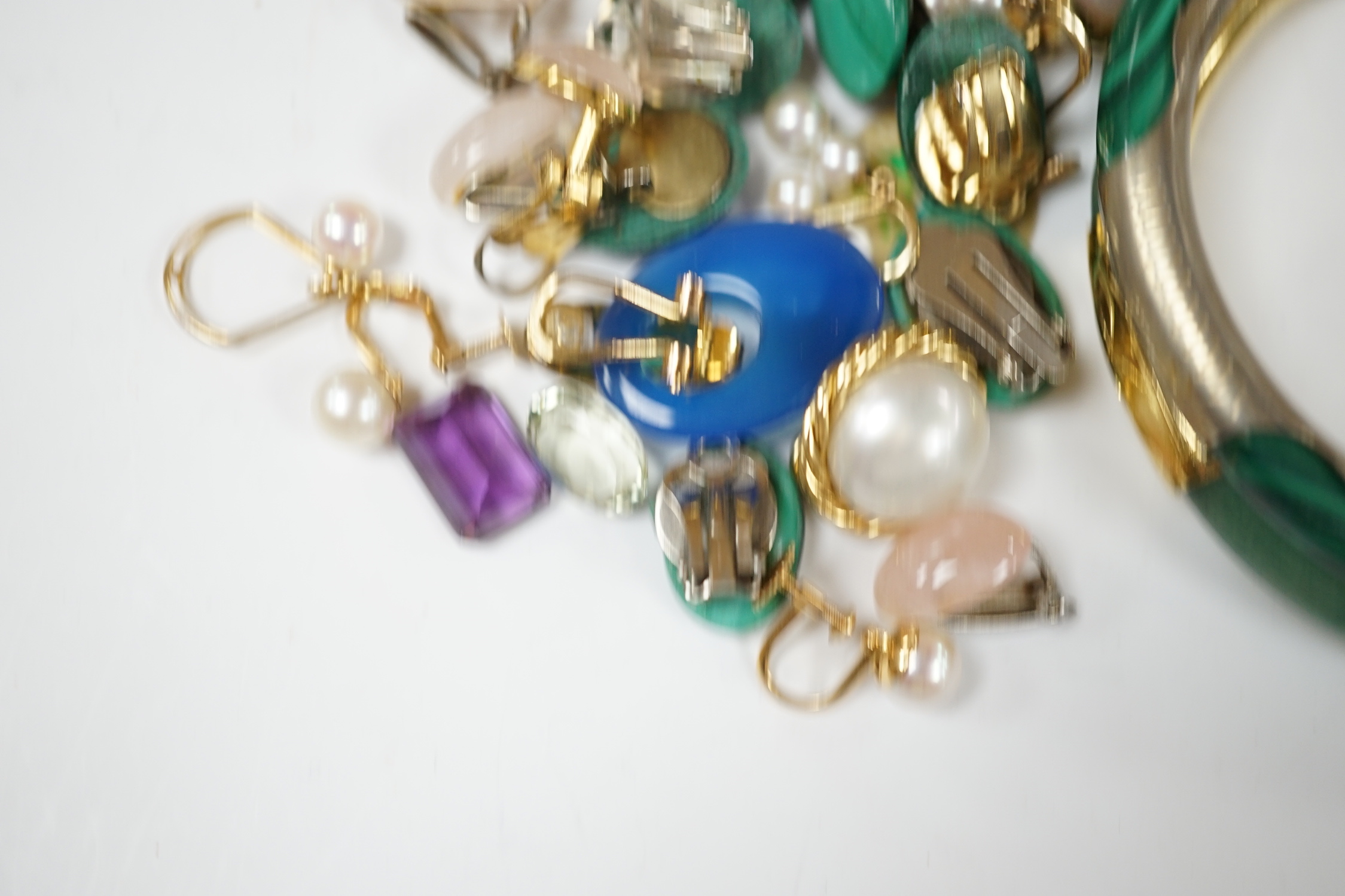 A pair of 14k and three stone cultured pearl set drop ear clips, 23mm, a pair of 18k and single stone cultured pearl set ear clips, a quantity of assorted costume ear clips and two bangles etc.